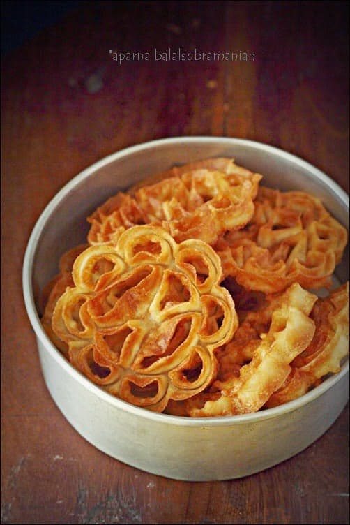 Gulab Puvu — rose-shaped Andhra fried sweet, golden and dusted with powdered sugar