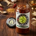 Amla Pickle — Andhra Store glass jar, front view