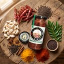 Fresh ingredients for Andhra Store Garlic Pickle — red chillies, garlic, curry leaves and whole spices