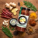 Fresh ingredients for Andhra Store Ginger Pickle — red chillies, garlic, curry leaves and whole spices