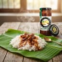 Ginger Pickle served on hot steaming rice on banana leaf — traditional Andhra style