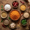 Fresh ingredients for Andhra Store coconut podi — roasted lentils, Guntur chilli and whole spices