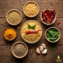 Fresh ingredients for Andhra Store kandi podi — roasted lentils, Guntur chilli and whole spices