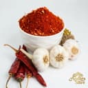red chilli garlic podi — Andhra Store ceramic bowl on white background, product photography